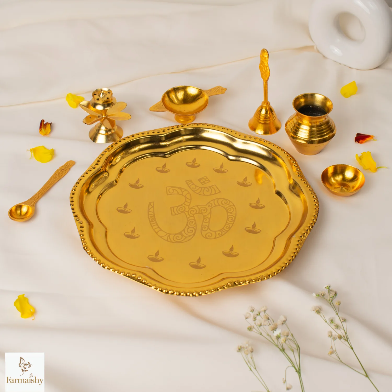Pooja thali with pooja bell, diya , lota, incense holder
